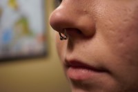 A woman with a septum nose piercing