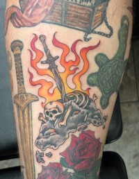 color tattoo of a dark souls bonfire