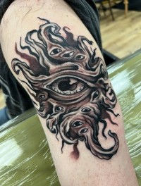 Black and grey tattoo of hermaeus mora from skyrim