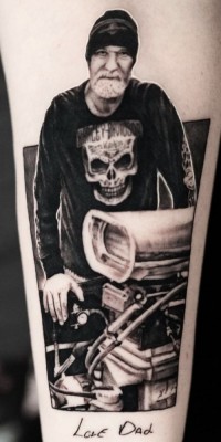 Black and white tattoo of a loved father from a personal photo
