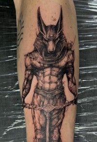 a tattoo of the Egyptian jackal-headed god, Anubis